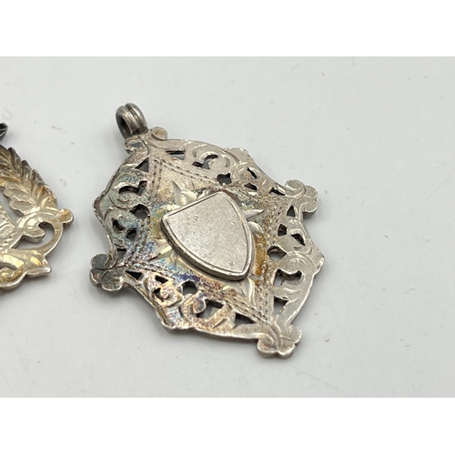 2069 - Three hallmarked Birmingham silver watch fobs/medallions - approx. gross weight 24.7g