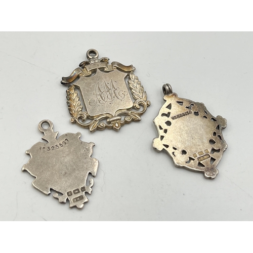 2069 - Three hallmarked Birmingham silver watch fobs/medallions - approx. gross weight 24.7g