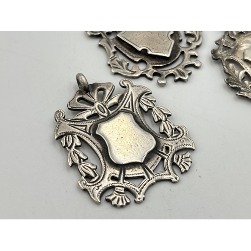 2070 - Three hallmarked Birmingham silver watch fobs/medallions - approx. gross weight 27.3g