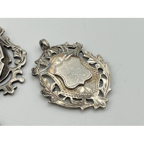 2070 - Three hallmarked Birmingham silver watch fobs/medallions - approx. gross weight 27.3g