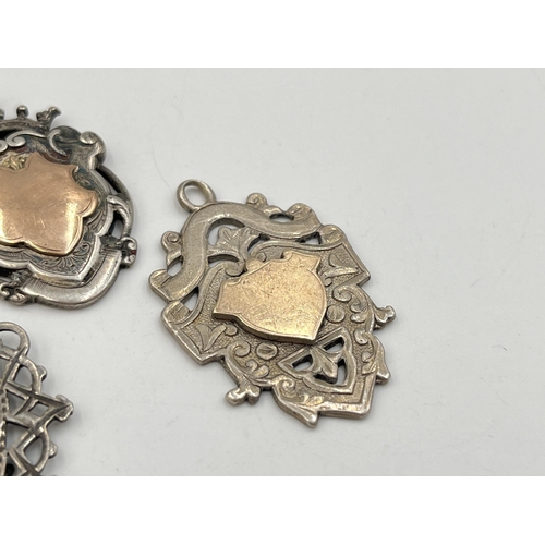 2071 - Three hallmarked Birmingham silver watch fobs/medallions - approx. gross weight 33g