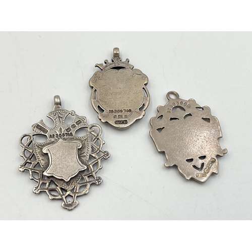 2071 - Three hallmarked Birmingham silver watch fobs/medallions - approx. gross weight 33g