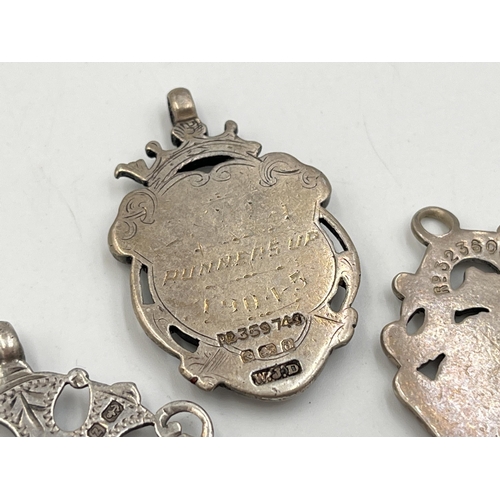 2071 - Three hallmarked Birmingham silver watch fobs/medallions - approx. gross weight 33g