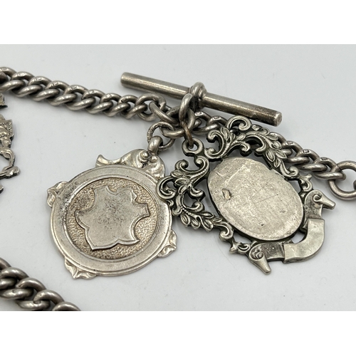 2073 - A hallmarked silver Albert chain with six watch fobs, five hallmarked Birmingham and one Albo silver... 