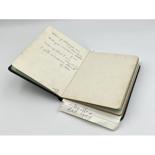 2082 - An early 20th century leather bound autograph album containing page titled 'Manchester City 3.3.27' ... 