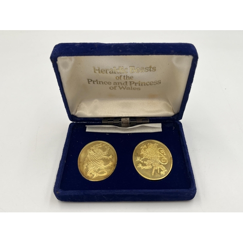 2085 - A cased set of two Danbury Mint 22ct gold plated hallmarked sterling silver Heraldic Beasts of the P... 