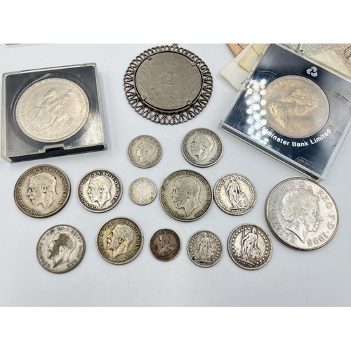 2087 - A collection of world banknotes and coins with silver examples to include 83.5% 1909 and 1914 Swiss ... 