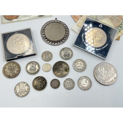 2087 - A collection of world banknotes and coins with silver examples to include 83.5% 1909 and 1914 Swiss ... 