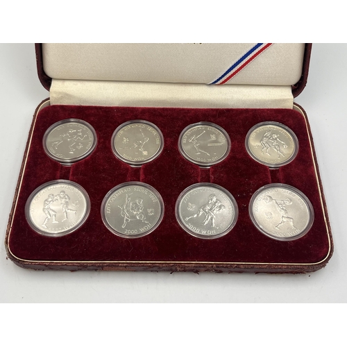 2088 - A cased set of eight 1988 Seoul Olympics South Korean commemorative non-circulating coins, four 1000... 