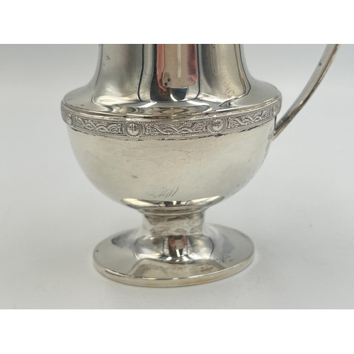 2095 - A Duncan & Scobbie hallmarked Birmingham silver milk jug, dated 1939 - approx. gross weight 132g and... 