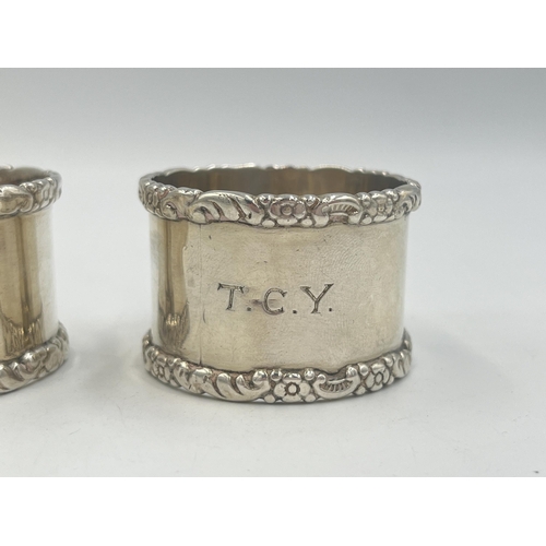 2100 - Two William Hutton & Sons hallmarked Birmingham silver napkin rings, one dated 1915 and one dated 19... 