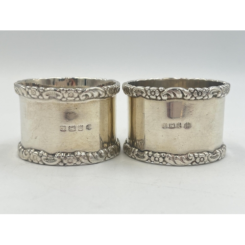 2100 - Two William Hutton & Sons hallmarked Birmingham silver napkin rings, one dated 1915 and one dated 19... 