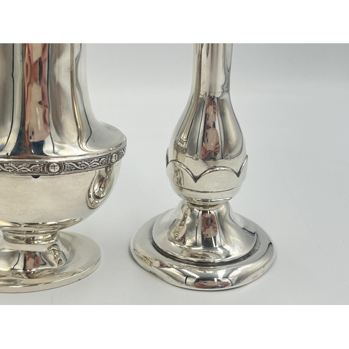 2101 - Two pieces of hallmarked Birmingham silver, one Bishton's Ltd. tulip vase, dated 1969 and one Duncan... 