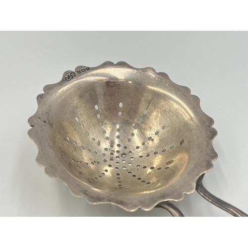 2106 - An Edwin Joseph Houlston hallmarked Birmingham silver tea strainer, dated 1920 - approx. gross weigh... 