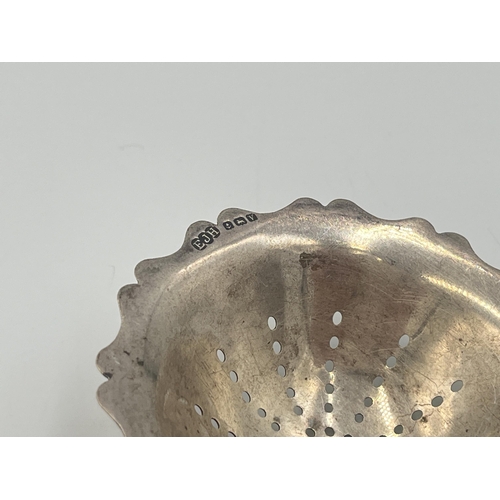 2106 - An Edwin Joseph Houlston hallmarked Birmingham silver tea strainer, dated 1920 - approx. gross weigh... 