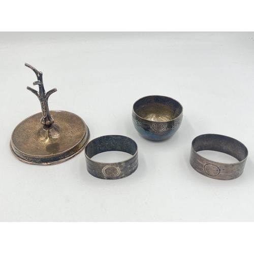 2109 - Four items, two hallmarked Birmingham silver napkin rings, one hallmarked Birmingham silver weighted... 