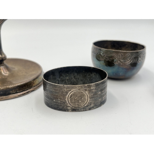 2109 - Four items, two hallmarked Birmingham silver napkin rings, one hallmarked Birmingham silver weighted... 