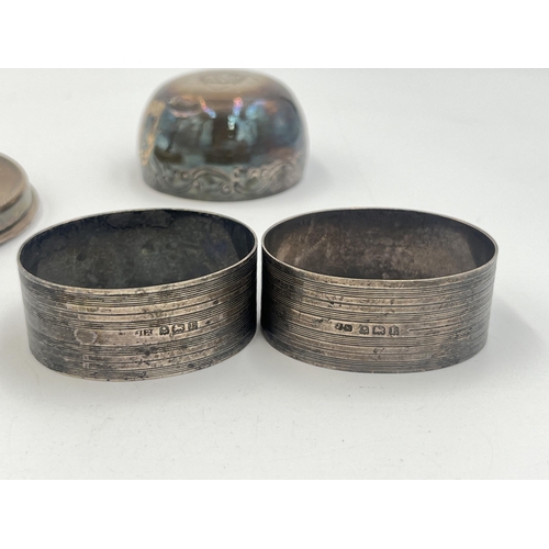 2109 - Four items, two hallmarked Birmingham silver napkin rings, one hallmarked Birmingham silver weighted... 