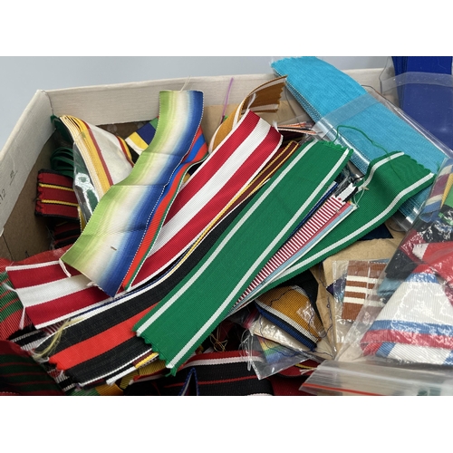 2150 - A large collection of military ribbon