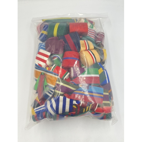 2151 - A large collection of military ribbon