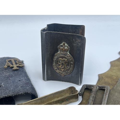 2155 - A collection of military items to include two WWI brass button cleaning guards - patent no. 116972/1... 