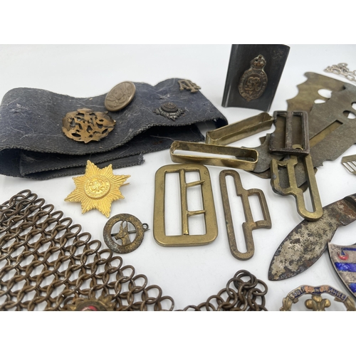 2155 - A collection of military items to include two WWI brass button cleaning guards - patent no. 116972/1... 