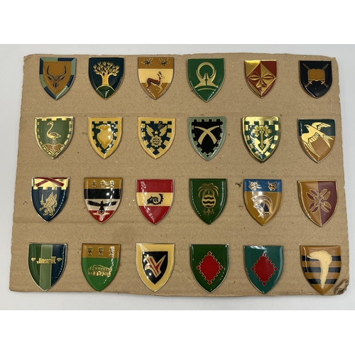 2163 - Twenty four South African military badges