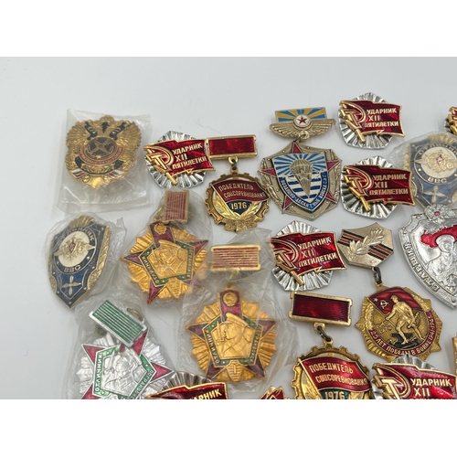 2171 - A collection of Russian badges and medals