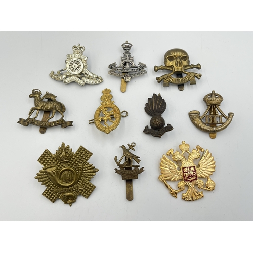 2186 - Ten military cap badges