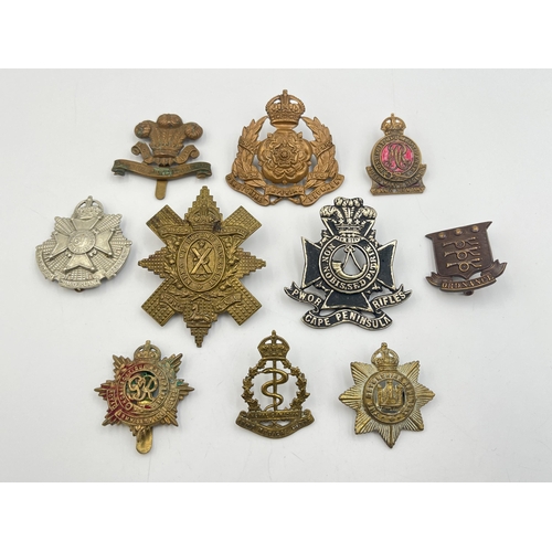 2189 - Ten military cap badges