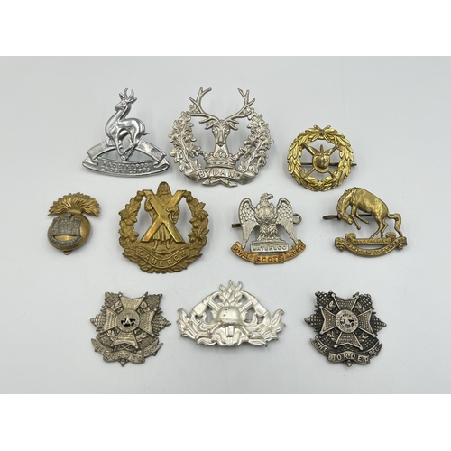 2190 - Ten military cap badges