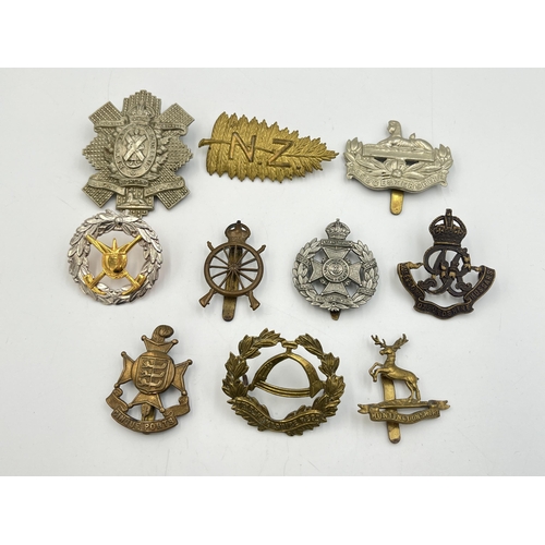 2191 - Ten military cap badges