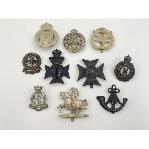 2194 - Ten military cap badges