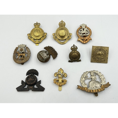 2196 - Ten military cap badges