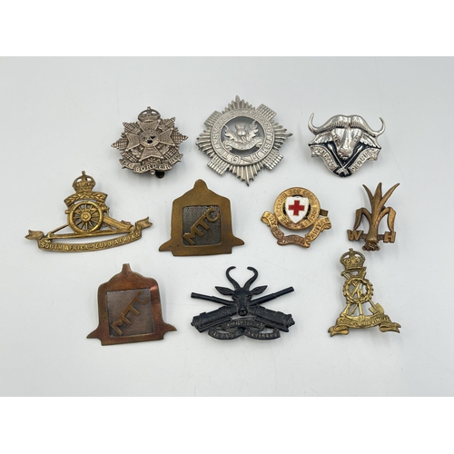 2199 - Ten military cap badges