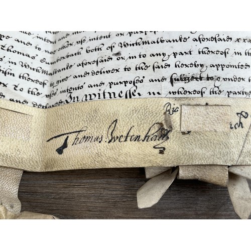 2079 - Two antique hand written indentures on vellum, one dated 1666 and one dated 1742