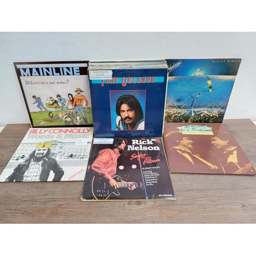 732 - A collection of LP vinyl records to include David McWilliams, Jerry Reed, Verity, Mainline, Steven H... 