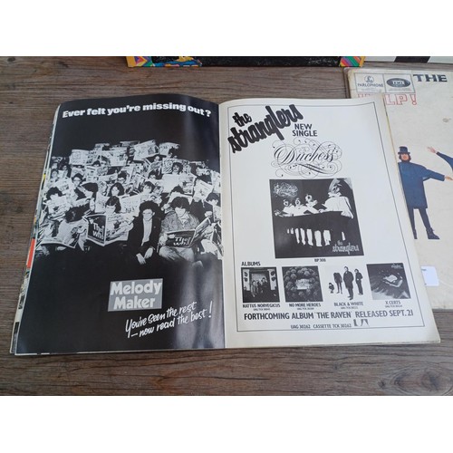 745 - Four items, one The Who 'Summer of '79' tour programme, one The Beatles 'Help!' LP vinyl record, one... 