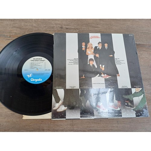 745 - Four items, one The Who 'Summer of '79' tour programme, one The Beatles 'Help!' LP vinyl record, one... 