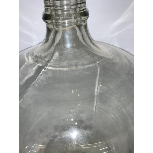 378A - A vintage glass demijohn - approx. 45cm high