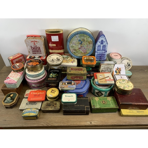 424 - A collection of vintage tins to include Senior Service cigarette, Black Magic chocolate, Emulsion an... 