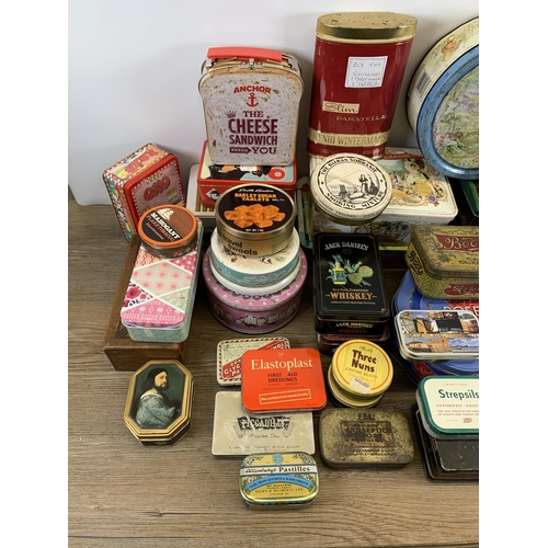 424 - A collection of vintage tins to include Senior Service cigarette, Black Magic chocolate, Emulsion an... 