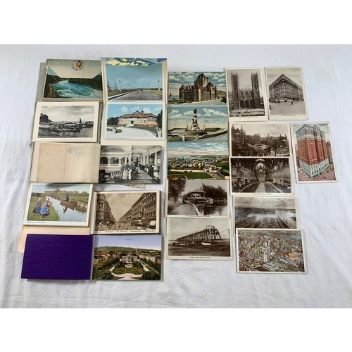 547 - An early 20th century postcard album containing a collection of Edwardian and later postcards to inc... 