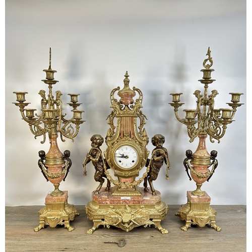 560 - A Rococo style Italian Imperial gilt metal and red marble chiming mantle clock and garniture set - c... 