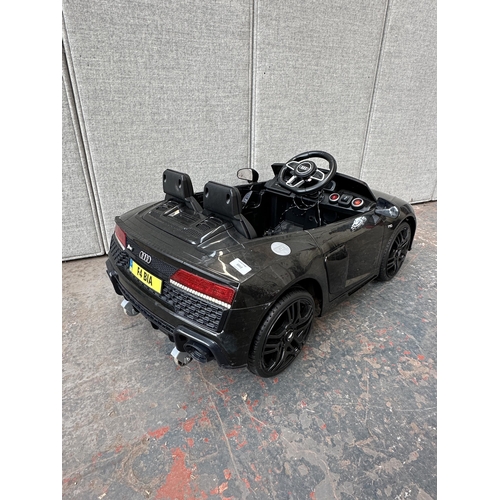 1012 - A children's electric ride on Audi R8 V10