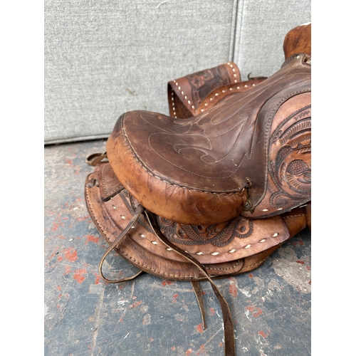 1022 - A brown leather American Western style horse saddle