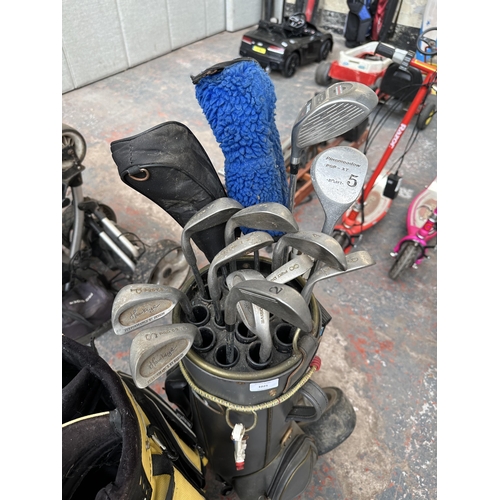 1025 - Two golf bags containing golf clubs to include Spalding, Pro Drive etc.