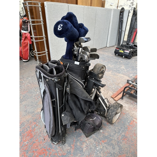 1026 - Three items, one Pro Rider electric golf trolley and two golf bags containing Dunlop clubs