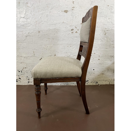 45 - Four Victorian carved mahogany and fabric upholstered dining chairs