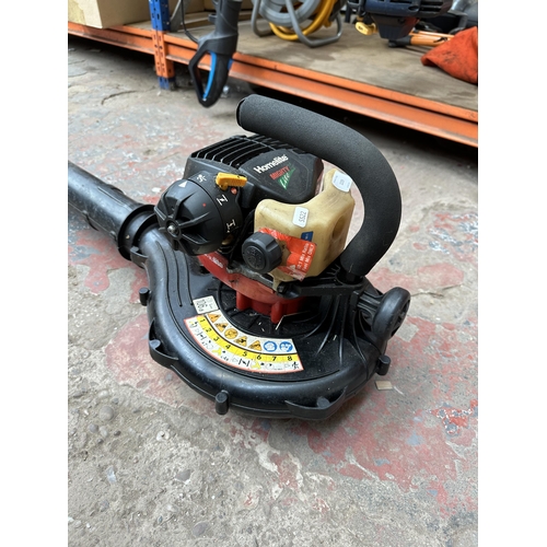 1039 - A Homelite Mighty Lite HBL26BV petrol leaf blower